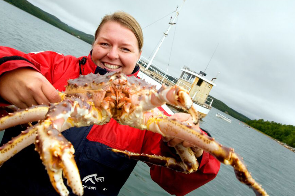 "Girl on king crap safari in Kirkenes"""
