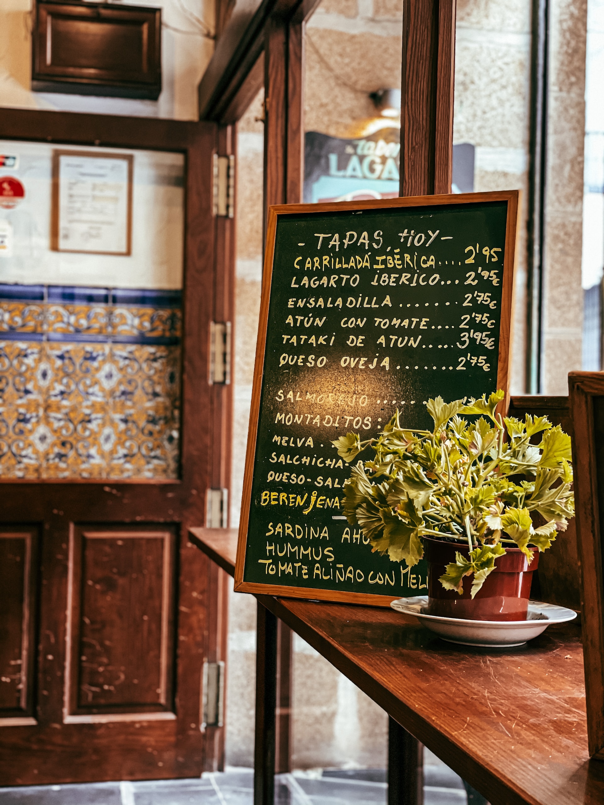 Tapas menu on wood board