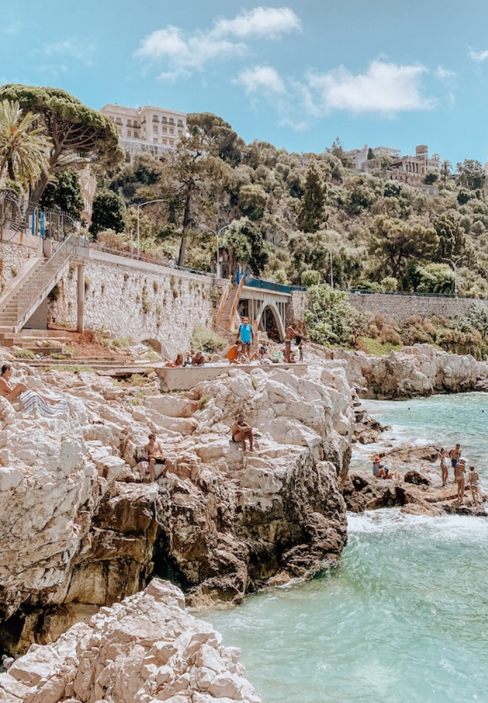 Rocks, pebble beach and ocean in Nice