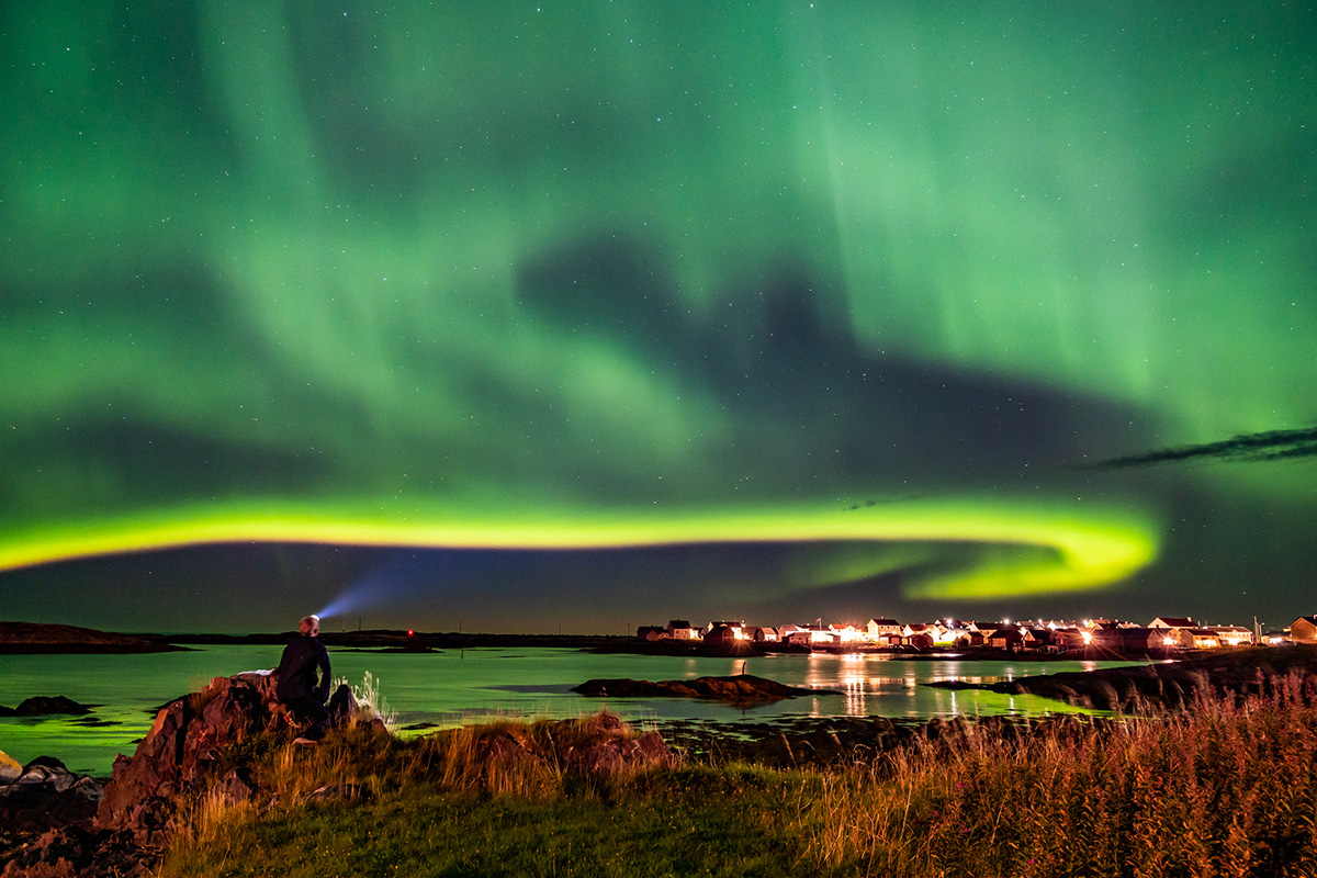 Aurora borealis on the Norway. Green northern lights above, aurora borealis