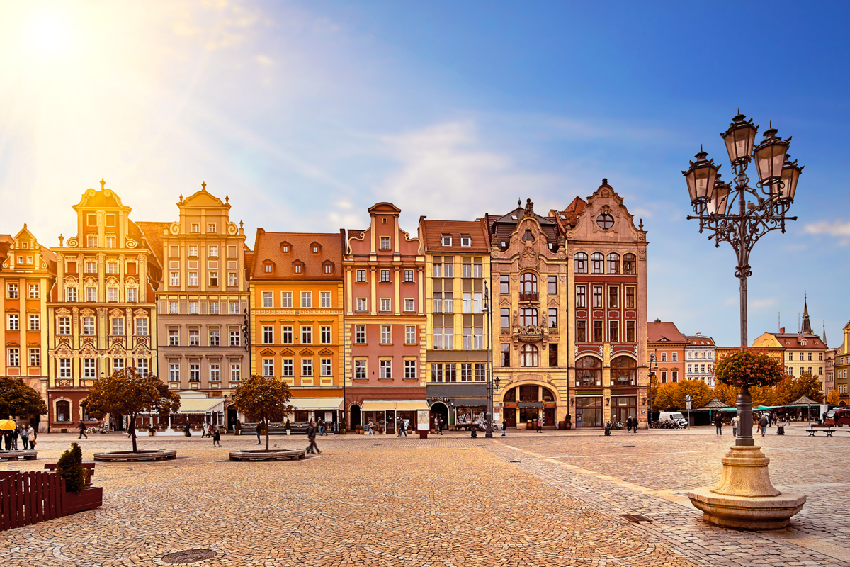 Krakow old square with sunlight coming in from the left