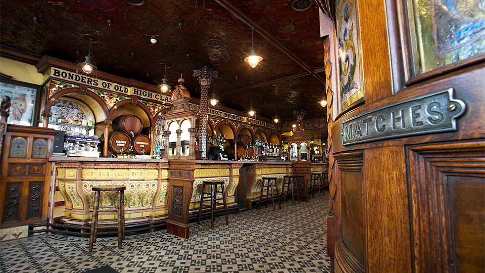 Fly to Belfast, visit Crow Liquor Saloon.