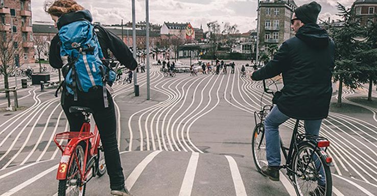 Fly to Copenhagen, experience the Danish bike culture.