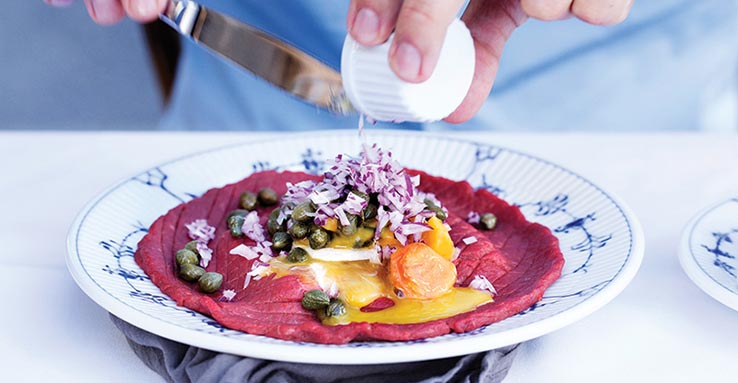 Fly to Copenhagen, try the Danish cuisine.