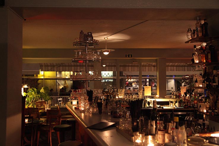Fly to Geneva, have a cocktail at La Verre à Monique.