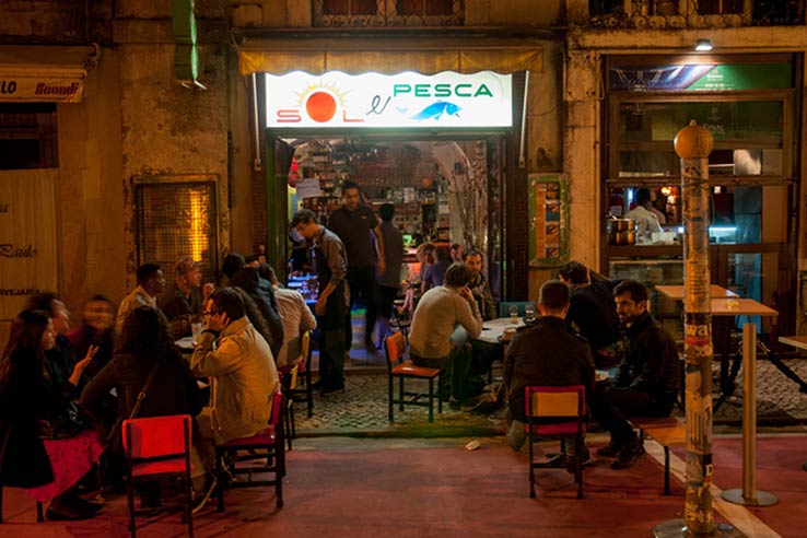 Fly to Lisbon, have a drink at Sol e Pesca.