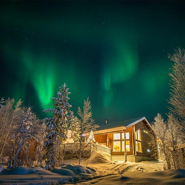 View over the northern lights in Rovaniemi, fly to Rovaniemi with Norwegian